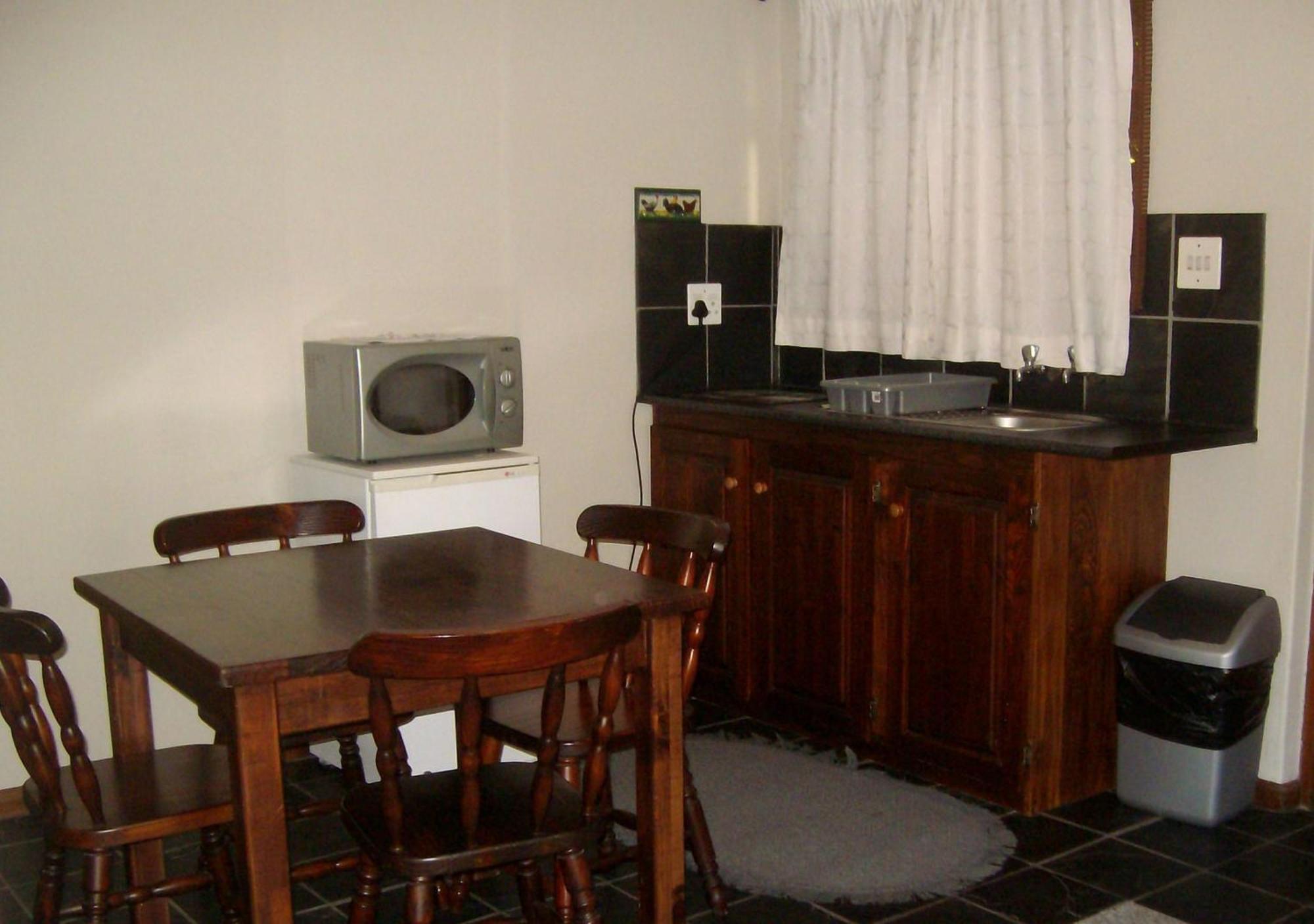 Be My Guest Lodge Bloubergstrand Rum bild